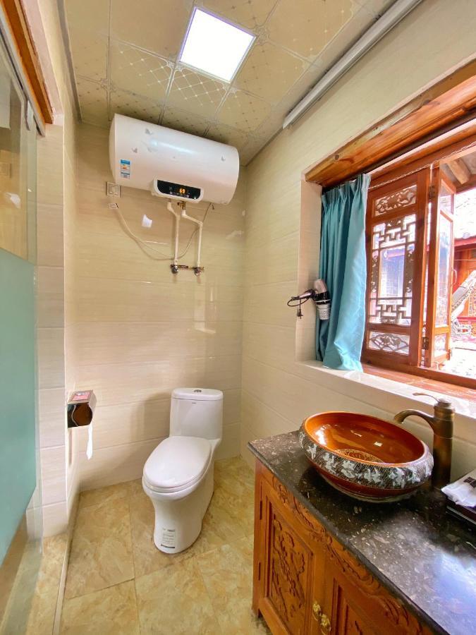 Juxian Boutique Homestay Лицзян Экстерьер фото