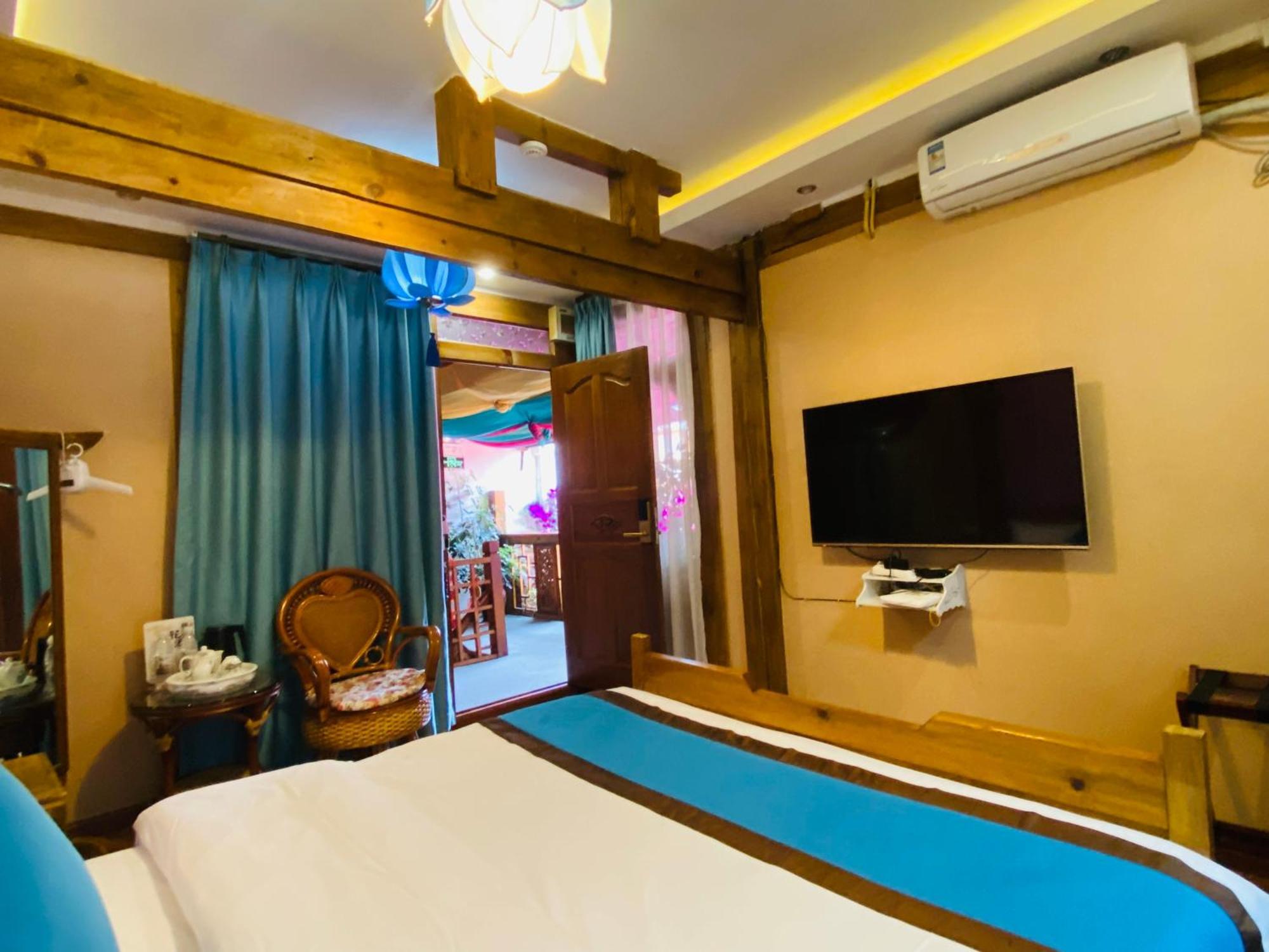 Juxian Boutique Homestay Лицзян Экстерьер фото