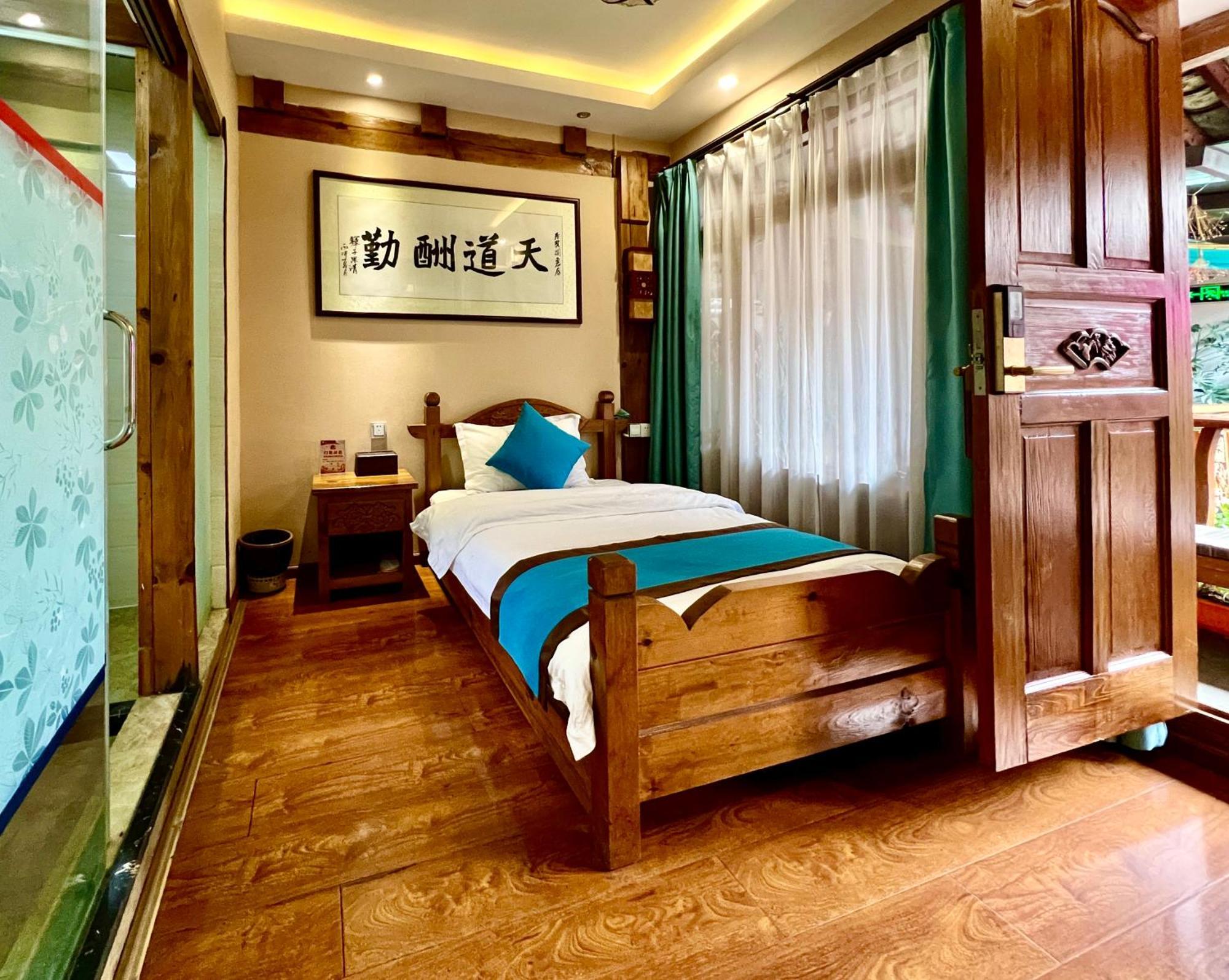 Juxian Boutique Homestay Лицзян Экстерьер фото