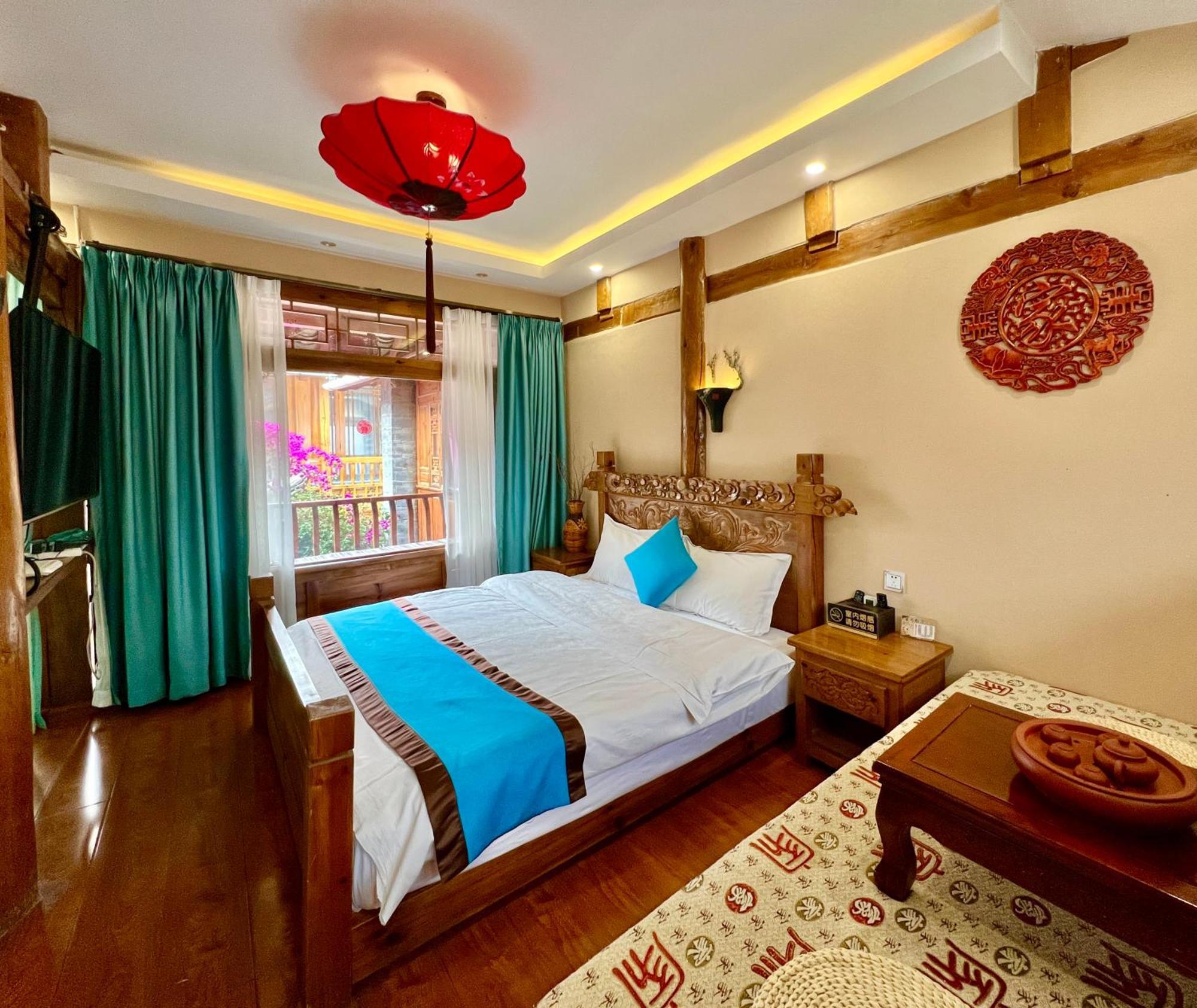 Juxian Boutique Homestay Лицзян Экстерьер фото
