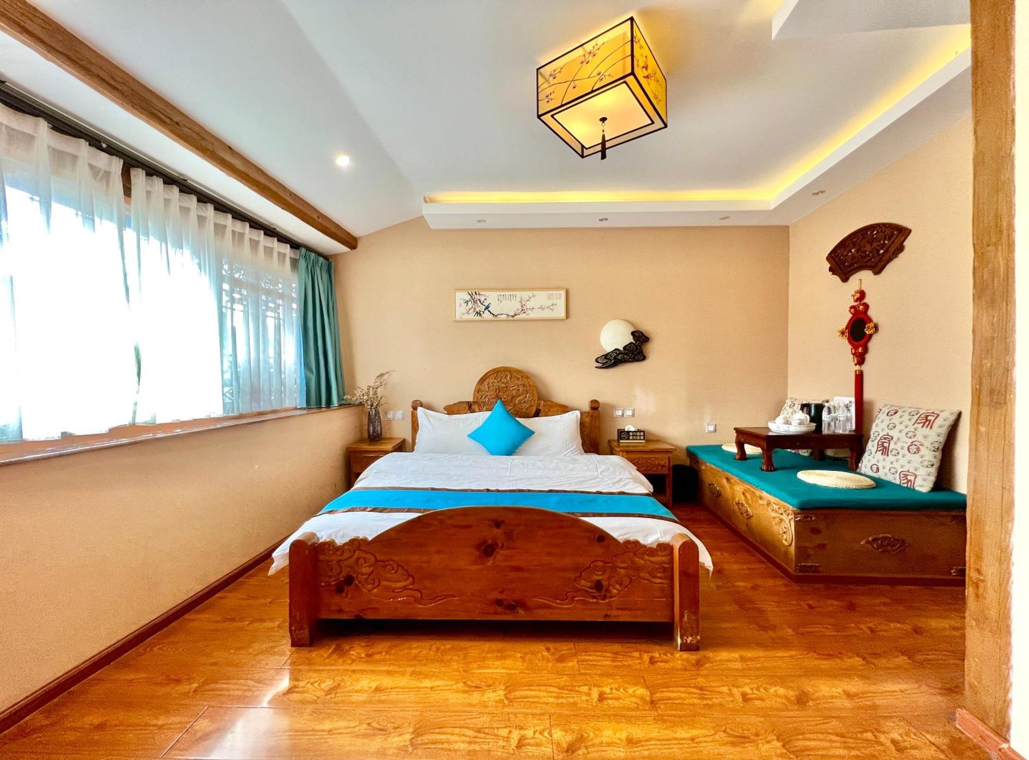 Juxian Boutique Homestay Лицзян Экстерьер фото